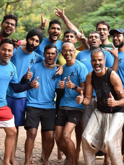 An energetic group photo filled with thumbs-ups and big smiles. This picture radiates the positive and supportive atmosphere that you will find in our community.