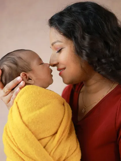 A mother and her baby, nose to nose. This simple, intimate pose is one of my favorites for showing the deep, unspoken connection and love.