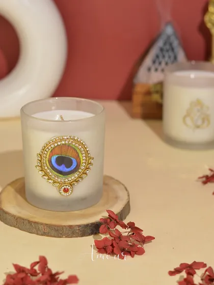 My Shri Krishna-inspired candle, featuring a beautiful peacock feather design, is a divine addition to your New Year celebrations.