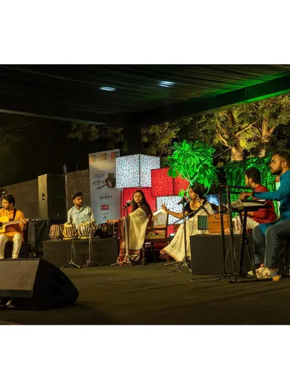 The full band performing for a large audience at Sahitya AajTak.