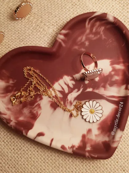 Our Aurora Heart Tray, featuring a deep maroon and white marble effect. This trinket dish is perfect for holding your favorite jewelry and makes a heartfelt, handmade gift.