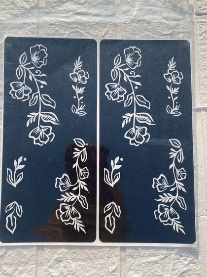 An example of my large stencils, featuring elegant floral vine patterns. These are great for creating designs on the arms or legs.