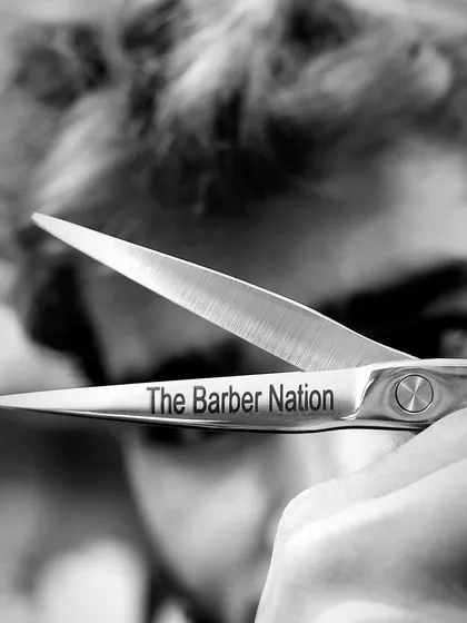 This is more than a name; it's a brand I've built with passion. My scissors are my primary tool, and every cut is a piece of art I create for my clients.