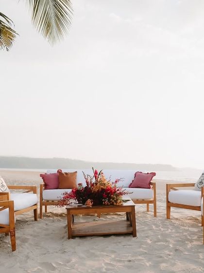 A comfortable lounge area set up right on the sand in Goa. This provided a relaxed space for guests to enjoy the beachside setting and the beautiful sunset.