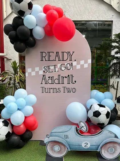 Ready, set, go! This race car-themed party was a high-speed hit, with a checkered flag finish line and sporty decor. We love creating a thrilling racetrack experience for our little speedsters.