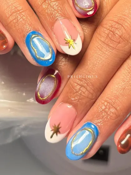 A unique set featuring tortoise shell print, a modern French with a gold star, and a blue gemstone effect with a gold frame.