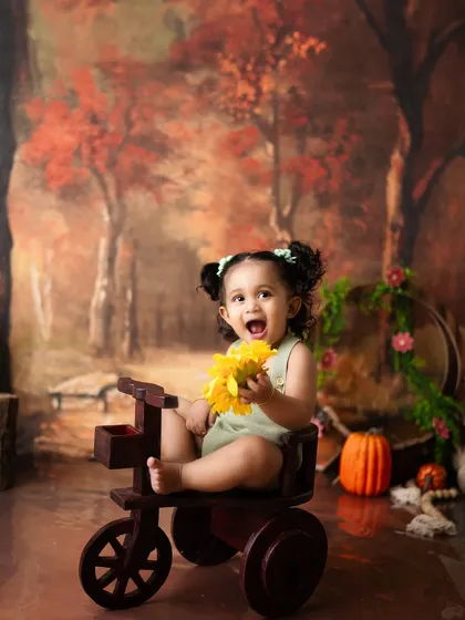 An expression of pure delight. These milestone sessions are all about capturing the personality and happiness of your growing child.