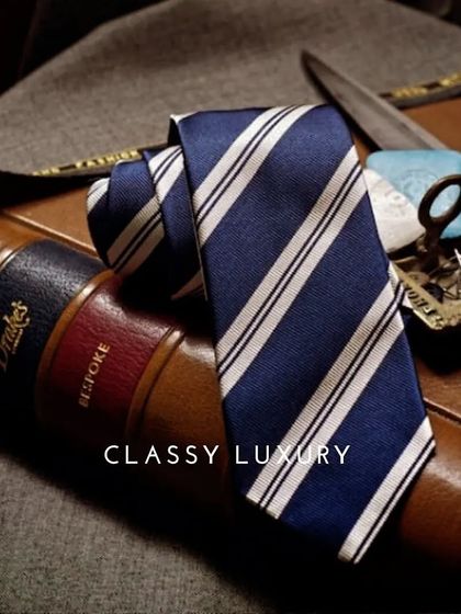 A classic striped tie, an example of the fine accessories I offer to complete a bespoke look. The right accessory is the final touch of class and luxury.
