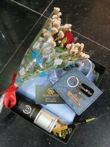 I believe a gift should show how much you care. This hamper with personalized items, a shirt, and flowers is designed to do just that.