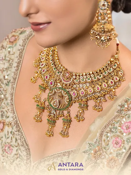 When blessings gather and elegance feels like destiny, it’s a choice made by the heart. This 22kt gold bridal choker with Kundan and meenakari work is designed for such unforgettable moments.