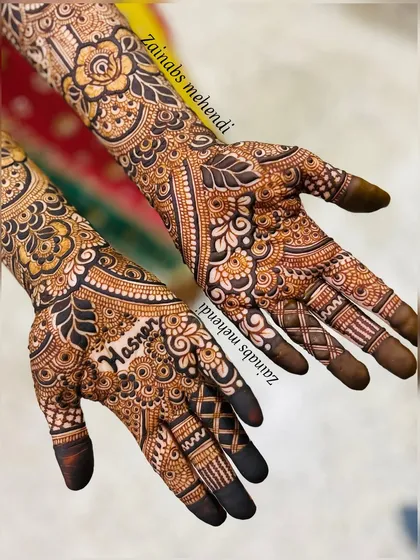 A close up of the palm, where the fusion of bold and intricate is most apparent.