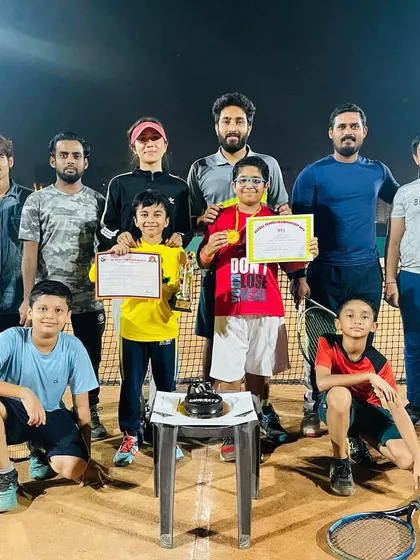 This is what our academy is all about. A group photo with our coaches and players celebrating a tournament win. We train hard as individuals but we always celebrate as a team and a family.