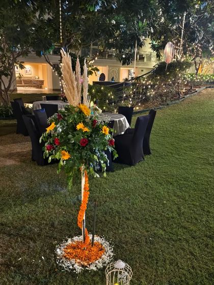 Another decorative floral tree prop placed in the garden area, adding to the festive and natural decor of the Diwali event.