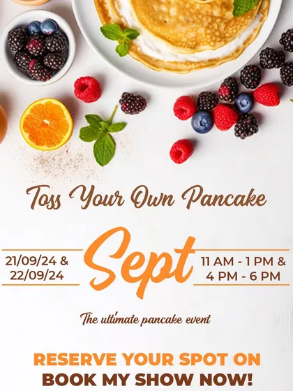 This poster for our September pancake event invites you to the ultimate pancake experience, complete with fresh fruit and other toppings.