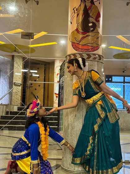 A tender moment between Yashoda and Krishna. The playful act of feeding butter is a classic story we often portray through Abhinaya in our classes.