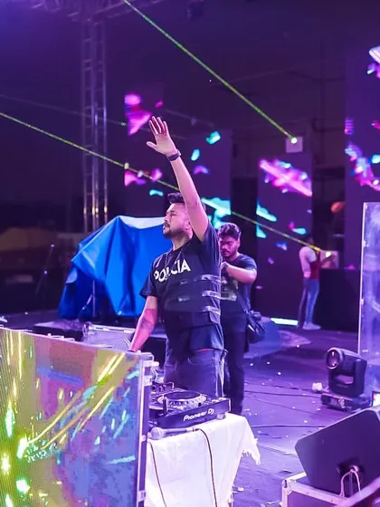 On stage at the BGI Timelapse festival. The laser beams and confetti create a stunning visual spectacle.