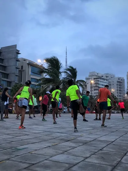 Cooling down is just as important as the workout itself. Our group stretching session at Bandstand helps improve flexibility and aids in muscle recovery.
