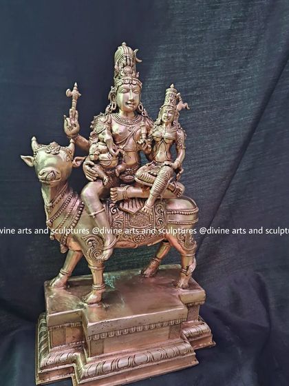 This unique 18-inch bronze sculpture portrays the entire Shiva family seated together on their divine vehicle, Nandi the bull. It is a beautiful representation of cosmic harmony and familial love.