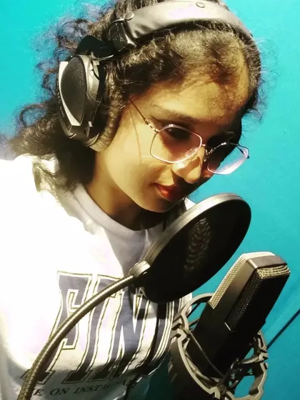 This is my happy place, the recording studio. There's a certain magic when the headphones go on and it's just me, the mic, and the music. All the noise fades away and I can just focus on delivering the most honest vocal performance.