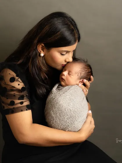 There is nothing more powerful than a mother's love. In the quiet moments of a newborn session, I focus on capturing that profound, gentle connection.