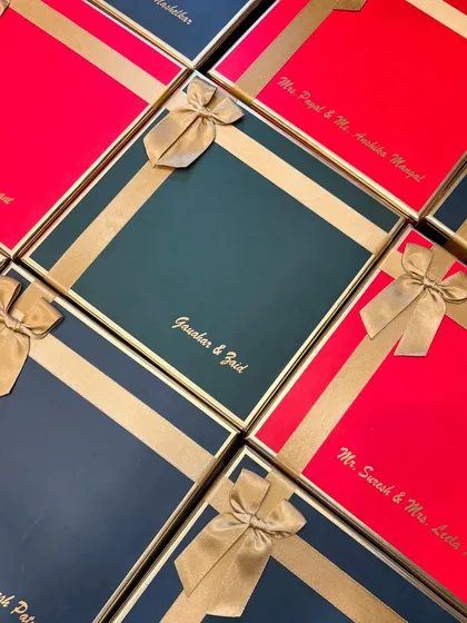 These custom-made signature hampers were created for Gauahar Khan and Zaid Darbar's special day. Each box, in vibrant red and deep green, was personalized with their names for an elegant touch.