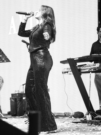 Another angle from the corporate show, this time a black and white shot focusing on my keyboardist and me. The band is an essential part of the live experience.