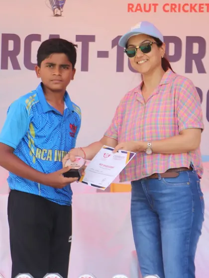A proud member of the champion RCA Indians team receiving his award.