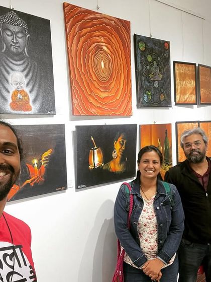 A selfie with visitors at the Rangoli Metro Art Centre exhibition.