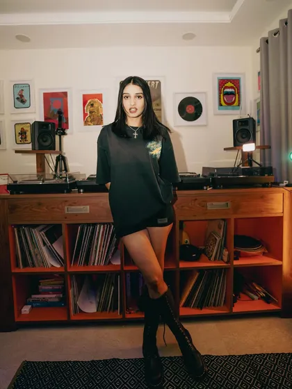 A full look at my creative space. My setup includes multiple turntables and a Pioneer DJ mixer, surrounded by my vinyl collection which is a constant source of inspiration for my house and disco productions.