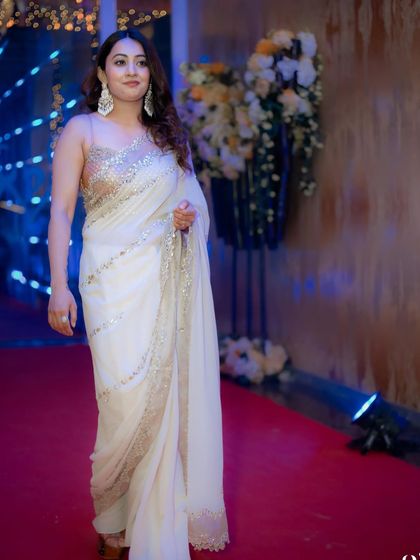 Walking the red carpet at a corporate Diwali event. I always bring a touch of glamour and sophistication to company parties.