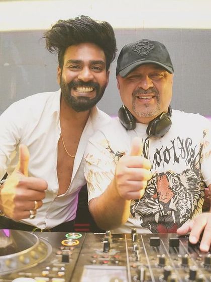 Sharing a thumbs up with a legend. Good vibes and mutual respect.