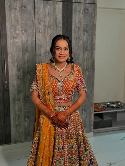 A happy and radiant engagement bride. Her natural-looking makeup and simple, elegant hairstyle let her joy shine through.