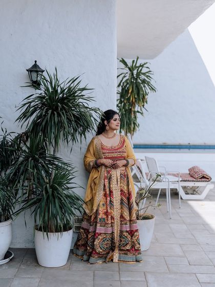 A collection of portraits from a beautiful Haldi photoshoot. I coordinate with the photo team to capture a variety of shots, from romantic close-ups and playful kisses to stylish individual portraits, all within a cohesive, sun-drenched theme.