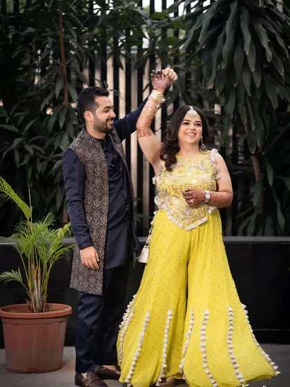 A candid moment of the couple at their Mehendi. The bride's hair and makeup held up perfectly, looking fresh and beautiful throughout the event.