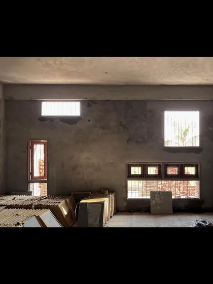 A work-in-progress view inside one of the classrooms. The careful placement of windows ensures that the space is filled with natural light, which is crucial for a positive learning environment.