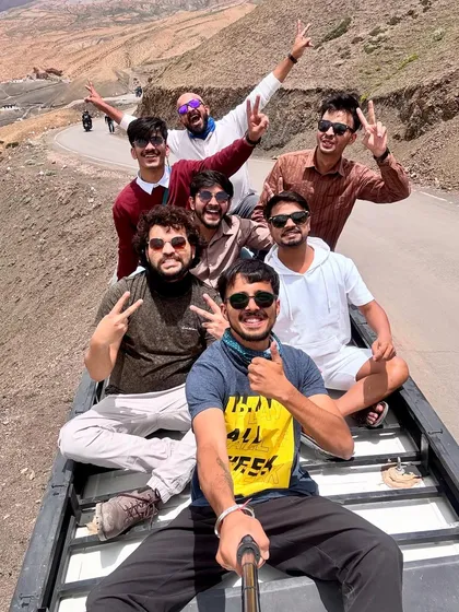 Sometimes the best views are from the roof of our Tempo Traveller. This is what my Himalayan road trips are all about: good music, great company, and making memories on the open road. This selfie captures the pure joy of a Spiti adventure.