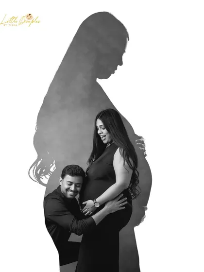 A creative black and white portrait that tells a story of connection. Using shadow and light, I created this artistic silhouette to represent the powerful presence of motherhood.