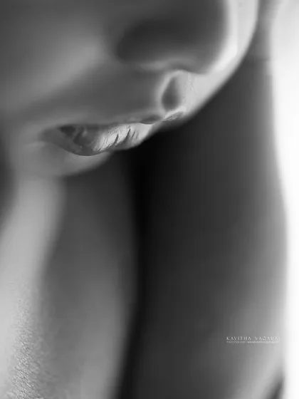 A macro shot of a newborn's mouth in black and white. These images take you back to the days when they fit perfectly in your arms.