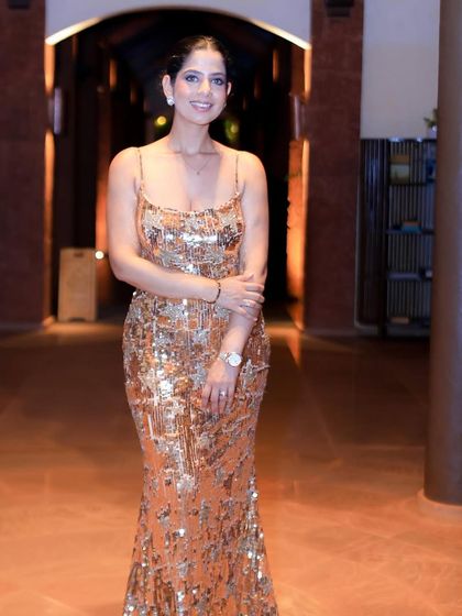 A full-length shot of my sequined gown for the Terumo India gala night in Goa. Dressing the part is essential for a glamorous event.