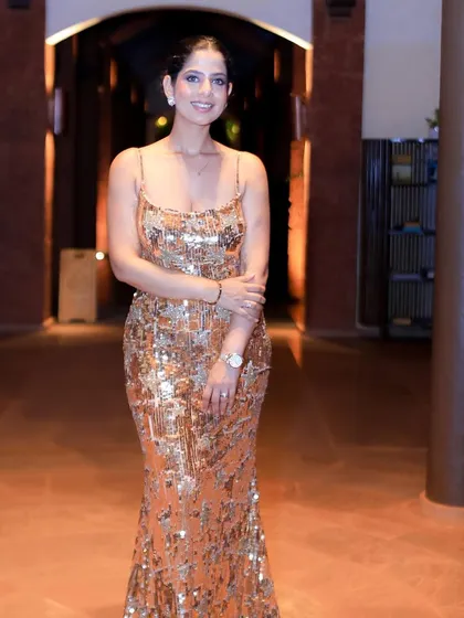 A full-length shot of my sequined gown for the Terumo India gala night in Goa. Dressing the part is essential for a glamorous event.