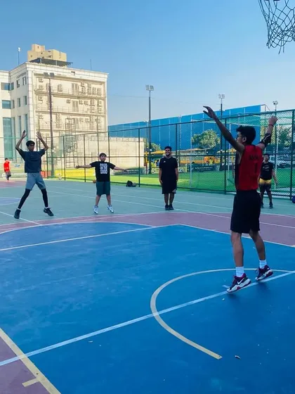Players work on their defensive closeouts, learning to contest shots without fouling.