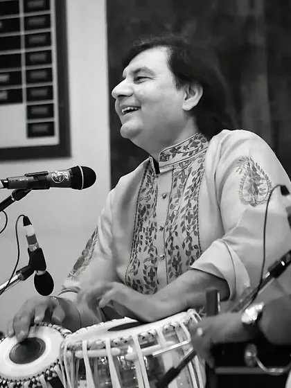 The joy of music is something that comes from within. This photograph captures a moment of 'lutf' or pure enjoyment during a solo performance, where the music simply takes over.
