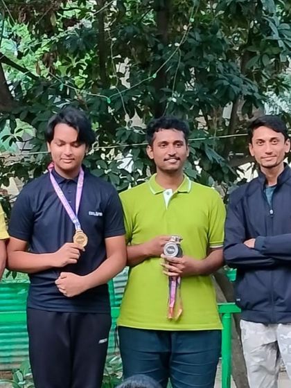 Our shooters, both junior and senior, celebrating their victories. My training programs are tailored to help athletes at every stage of their competitive journey reach their full potential.