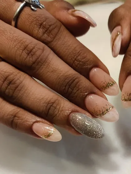 Perfect for wedding season, this elegant design features a marble base with a delicate gold glitter fade and a full silver glitter accent nail.