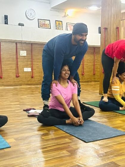 Partner stretches, like this assisted butterfly pose, allow for a deeper release and opening. It's a beautiful way to connect and help each other progress.