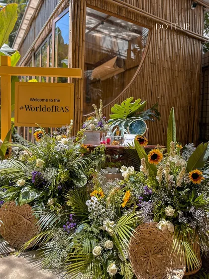 Welcome to the 'World of RAS'. For this skincare brand's pop-up, we created a complete sensory experience that brought their 'farm-to-face' ethos to life. The entrance, built with natural bamboo and overflowing with sunflowers, instantly immersed guests in the brand's fresh, organic identity. 🌸