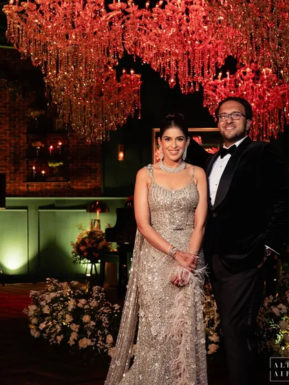 The happy couple at their stunning reception. My goal is always to create a backdrop that not only wows guests but also feels like a true reflection of the couple's style and personality.
