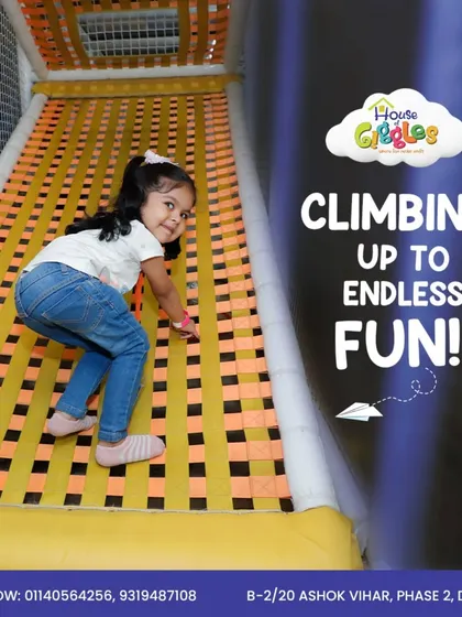 Climbing up to endless fun! This little adventurer is tackling our netted climbing ramp, building coordination and courage with every step.