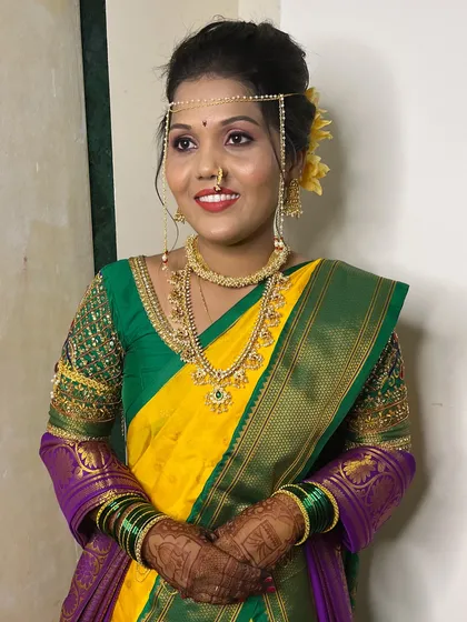 The complete look for Urvashi's wedding day. The makeup is designed to be long-lasting and picture-perfect throughout the ceremony.