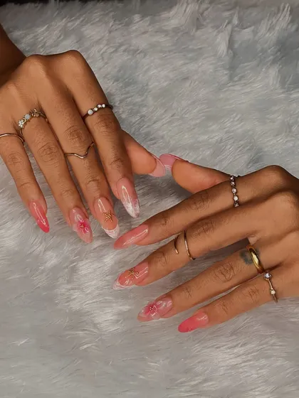 A full view of this dramatic and beautiful nail set, showcasing the length, shape, and intricate details that our students learn to master.
